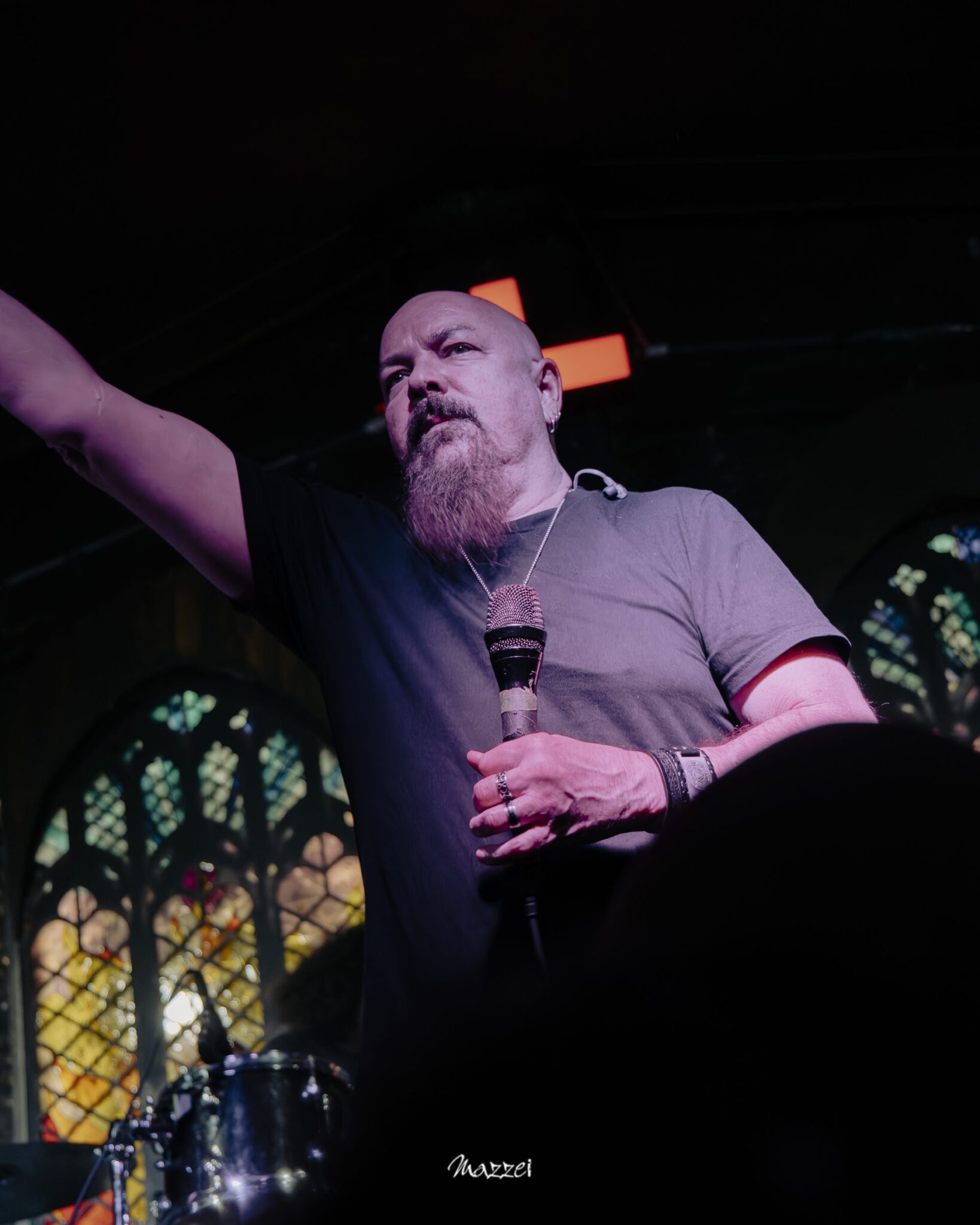 Robert Lowe pointing toward the crowd